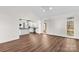 Bright and airy room connected to a kitchen with a breakfast bar and modern appliances at 620 St Lukes Church Rd, Salisbury, NC 28146