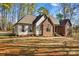 Well-maintained single-story home with brick and siding, manicured landscaping, and a walkway at 620 St Lukes Church Rd, Salisbury, NC 28146