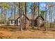 Charming single-story brick home featuring a well-maintained lawn and mature trees at 620 St Lukes Church Rd, Salisbury, NC 28146