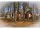 Charming single-story brick home featuring a well-maintained lawn and mature trees at 620 St Lukes Church Rd, Salisbury, NC 28146