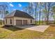 Spacious detached two-car garage with a large concrete driveway and an additional green space at 620 St Lukes Church Rd, Salisbury, NC 28146