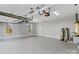 Large, clean garage interior with painted walls, high ceilings, and visible utilities for potential buyers at 620 St Lukes Church Rd, Salisbury, NC 28146