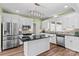 Charming kitchen with stainless steel appliances, granite countertops, and a tiled backsplash at 620 St Lukes Church Rd, Salisbury, NC 28146