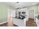 Spacious kitchen boasts an island with granite countertops and stainless steel appliances at 620 St Lukes Church Rd, Salisbury, NC 28146
