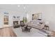 Bright and airy living room with stylish furnishings, light wood floors, and natural light at 620 St Lukes Church Rd, Salisbury, NC 28146