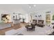 Bright and airy living room connected to a kitchen with a breakfast bar and modern appliances at 620 St Lukes Church Rd, Salisbury, NC 28146
