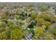 An overhead view of a neighborhood showcasing a charming house nestled among lush trees at 706 Annieline Dr, Shelby, NC 28152