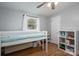 Bright bedroom boasts a raised bed with built-in shelving, creating a functional space at 706 Annieline Dr, Shelby, NC 28152