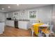 The view combines a dining area with a view of the kitchen featuring stainless steel appliances at 706 Annieline Dr, Shelby, NC 28152