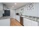 Updated kitchen showcasing granite countertops, stainless steel appliances, and ample cabinet space at 706 Annieline Dr, Shelby, NC 28152