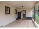 Covered outdoor patio includes storage chest and metal cabinet with direct access to yard at 706 Annieline Dr, Shelby, NC 28152