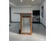 Basement bar with wood trim and corrugated metal, with sink and window at 923 Wyke Rd, Shelby, NC 28150