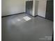 This bedroom features grey walls, a built in closet, and ample lighting at 923 Wyke Rd, Shelby, NC 28150