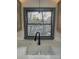 Close-up of kitchen sink and counter with view to outside greenery through the window at 923 Wyke Rd, Shelby, NC 28150