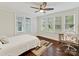 Bright bedroom with hardwood floors, large windows, and natural light, perfect for a home office at 925 E 35Th St, Charlotte, NC 28205