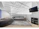 Comfortable lounge area with a plush beanbag chair and cozy gray sofa at 925 Westmere Ave, Charlotte, NC 28208