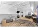 Spacious open living area with lounging spaces and industrial style ceiling at 925 Westmere Ave, Charlotte, NC 28208