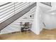 Compact office space under stairs, featuring a desk, chair, and a sleek, minimalist design at 925 Westmere Ave, Charlotte, NC 28208