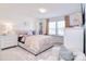 Inviting bedroom with soft furnishings, a dresser, and a window with decorative curtains at 966 Scotch Meadows Loop, Monroe, NC 28110