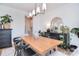 Stylish dining room with wood table, pendant lighting, and modern decor at 966 Scotch Meadows Loop, Monroe, NC 28110
