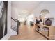 Open foyer with wood floors leading into the living spaces, illuminated by natural light at 966 Scotch Meadows Loop, Monroe, NC 28110
