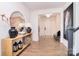Bright foyer with wood floors, decorative console table, and elegant decor at 966 Scotch Meadows Loop, Monroe, NC 28110