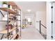 Hallway with carpet, a bookshelf, and access to other rooms in the home at 966 Scotch Meadows Loop, Monroe, NC 28110