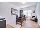 Home office featuring a wooden desk, black office chair, and natural light at 966 Scotch Meadows Loop, Monroe, NC 28110