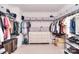 Spacious walk-in closet with ample storage, shelving, and hanging rods at 966 Scotch Meadows Loop, Monroe, NC 28110