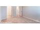 Neutral bedroom with a closet, light grey walls, white trim, and neutral carpeting to complete the space at 9842 Quercus Ln, Huntersville, NC 28078