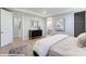 Comfortable main bedroom with an ensuite bathroom, featuring neutral tones and lots of natural light at 9842 Quercus Ln, Huntersville, NC 28078
