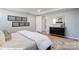 Calm main bedroom with a comfortable bed, dresser, and doorways leading to other rooms at 9842 Quercus Ln, Huntersville, NC 28078
