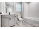 This bathroom features modern fixtures and a combined shower and tub at 9934 Cask Way, Huntersville, NC 28078