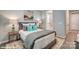 Comfortable bedroom with a queen bed and a view into an ensuite bathroom at 9934 Cask Way, Huntersville, NC 28078