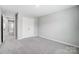 A bedroom with carpet flooring and a closet with double doors at 9934 Cask Way, Huntersville, NC 28078