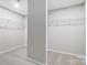 A walk-in closet with carpeted floors and wire shelving, offering ample storage space at 9934 Cask Way, Huntersville, NC 28078