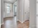 Welcoming entryway with hardwood floors and view into living spaces at 9934 Cask Way, Huntersville, NC 28078