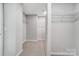 This walk-in closet features carpeted floors, wire shelving, and ample storage space at 9934 Cask Way, Huntersville, NC 28078