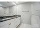 Elegant bathroom with double sinks, modern vanity, and a large mirror, creating a luxurious feel at 9957 Cask Way, Huntersville, NC 28078