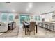 Open-concept dining area with wood floors and access to living room and kitchen at 9957 Cask Way, Huntersville, NC 28078