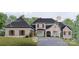 Elegant home featuring a stone and brick facade, a three-car garage, and professionally landscaped front yard at 10835A Wildlife Rd, Charlotte, NC 28278