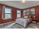 Cozy bedroom with neutral tones, warm lighting, and a view of the outdoors at 12848 Mustang Dr, Midland, NC 28107