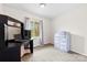 Bedroom with a desk, dresser, natural light and neutral tones, offering comfortable workspace at 1308 Gaston Way, Dallas, NC 28034