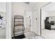 Hallway with neutral tones, connecting bedrooms, and featuring stylish storage, offering practical living at 1308 Gaston Way, Dallas, NC 28034