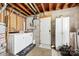 Functional laundry area with washer, dryer, and storage, providing convenience for household chores at 1308 Gaston Way, Dallas, NC 28034