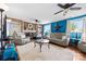 Inviting living room with a brick fireplace, cozy seating, and hardwood floors for a comfortable living space at 1308 Gaston Way, Dallas, NC 28034