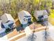 Aerial view of homes in a well-maintained neighborhood with tree-lined streets at 1929 Shorthorn St, Charlotte, NC 28213
