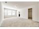 Bright bedroom featuring neutral walls, closet, and lots of light at 1929 Shorthorn St, Charlotte, NC 28213