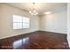 Bright dining area with hardwood flooring, chandelier, and natural light at 1929 Shorthorn St, Charlotte, NC 28213