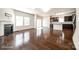 Open-concept living room with fireplace, dining area, and access to the kitchen at 1929 Shorthorn St, Charlotte, NC 28213